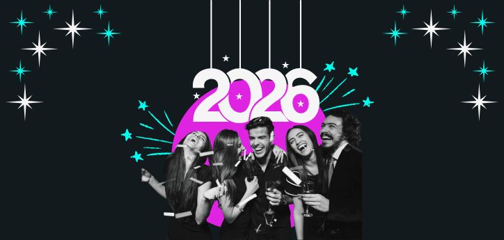 Group of people dressed in formal attire celebrating in front of a large ‘2026’ sign with a vibrant pink background and decorative star graphics.